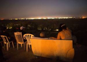 Citizens of Southern Israel gather to watch and enjoy the Gaza  slaughter