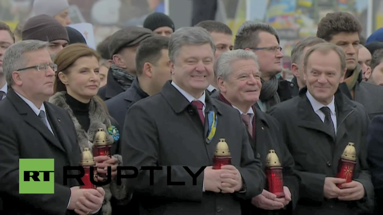 Ukraine President Poroshenko had good laugh during the prayers for the Maidan victims. Wellknown Washington "accessory" Donald Tusk of Poland is pictured to the right, also laughing. Good to see the Debaltseve catastrophe didn't get him down!