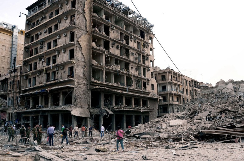 Aftermath of a triple suicide bombing attack in Aleppo, late 2012. (source)