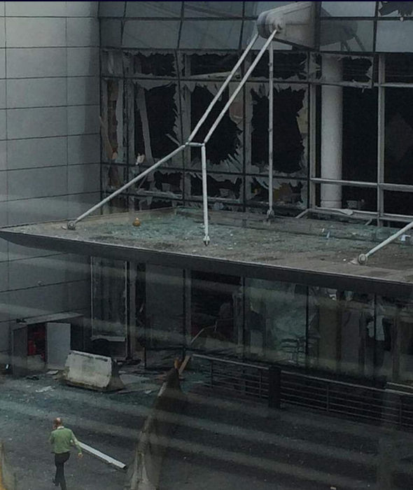 Damage to a building that is part of the Zaventem Airport complex following reported explosions. 