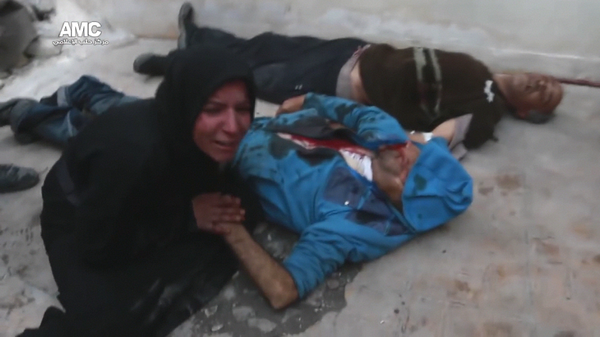 Eastern Aleppo pocket:a female civilain grief is raw follwoing the death of two male civilians, presumably relatives.